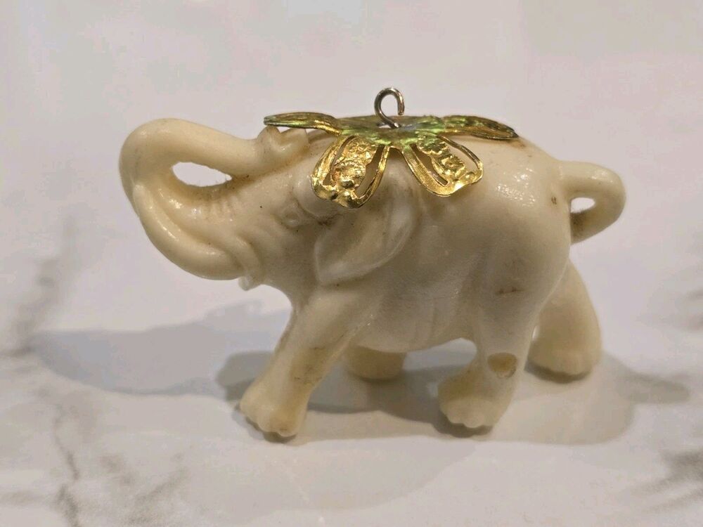 Vintage Celluloid Lucky Elephant Charm Pendant Faux Ivory Raised Trunk Gold Tone